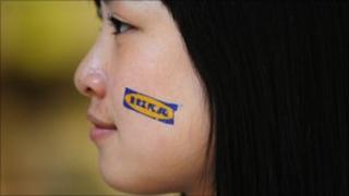 Sales assistant at the opening of Ikea's Nanjing store in China