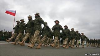 Polish soldiers march before flying on a Nato mission to Afghanistan (file picture)