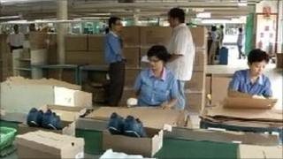 Workers at the Prima Inreksa shoe factory outside Jakarta
