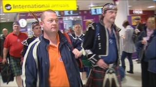Fans arriving at Edinburgh airport