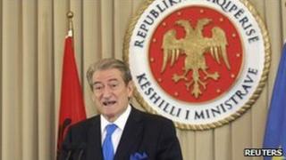 Albanian Prime Minister Sali Berisha addresses reporters in Tirana, 7 October