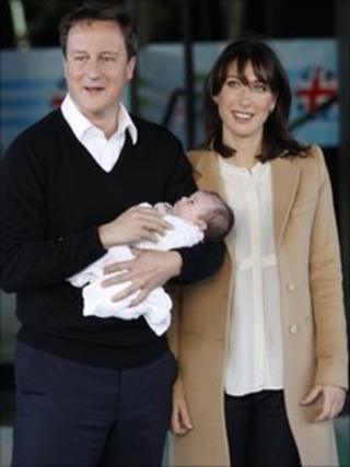 Prime Minister David Cameron and his wife Samantha arrive with their baby daughter, Florence during the Conservative Party conference in Birmingham.