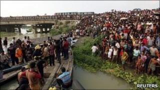 Locals gather at the crash site
