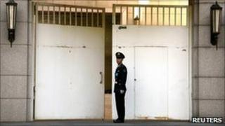Guard at gate of party cttee meeting hall 15 Oct 2010