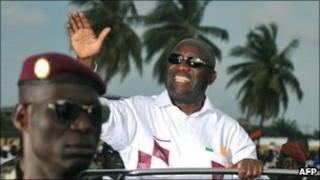 Ivorian President Laurent Gbagbo greets the public on 10 October 2010 at a stadium in Abidjan