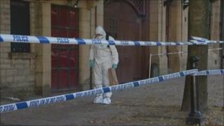Forensic officers at scene of crash