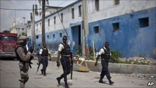 Police officers at the entrance to the National Penitentiary in Port-au-Prince, Haiti - 17 October 2010