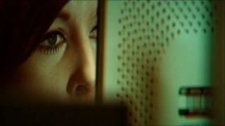 Woman looking at computer screen
