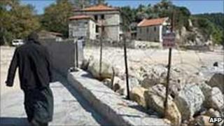 A monk walks towards the monastic community of Mount Athos. Photo: October 2008