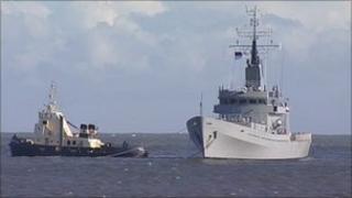 Former HMS Dumbarton Castle being towed