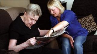 Staff of ILS helping client