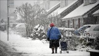 Woman walking in snow