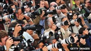 Photographers at a film event