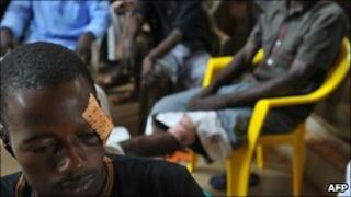 A man that was injured to the head during altercations between supporters of Cellou Dalein Diallo and Alpha Conde after a campaign rally in Conakry