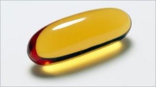 A vitamin E capsule