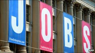 A jobs sign is seen on the front of the US Chamber of Commerce building