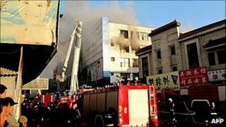 Firefighters tackle the blaze in Jilin, northern China
