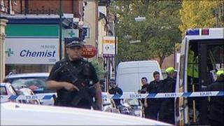 Armed police at Beech Avenue