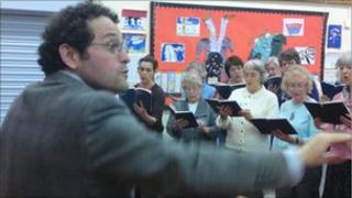 Marco Fanti with the choir