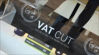 A sign advertising a VAT cut