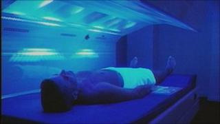 Man on sunbed (archive image)