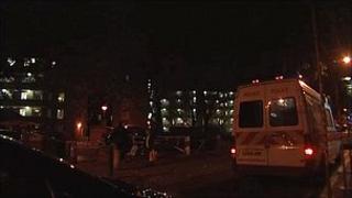 Police tape outside Strang House