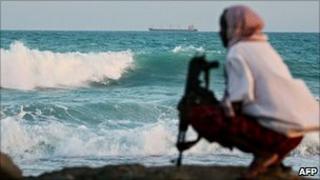 Pirate keeps watch off Somali coast (file image)