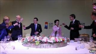 This handout on November 12, 2010 shows EU President Herman Van Rompuy (2nd L), South Korea"s President Lee Myung-bak (3rd L), Lee"s wife Kim Yoon-ok (3rd R) andSpain"s Prime Minister Jose Luis Rodriguez Zapatero (2nd R) during a dinner of the G20 Summit