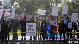 Protesters line the presidents' motorcade route in Los Angeles