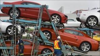 General Motors workers load Chevrolet Camaros at the company's Oshawa Ontario facility in Canada