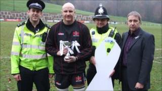 Members of the White Ribbon campaign