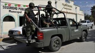 Mexican soldiers on a pick-up truck in Chihuahua state, 20 October 2010
