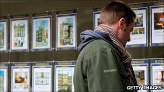 Looking in an estate agent's window