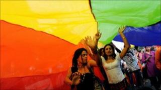 People dance at a gay pride march in Delhi. India (28 Nov 2010)
