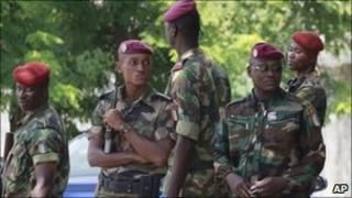 Ivorian soldier on guard at the electoral commission in Abidjan, 1 December 2010