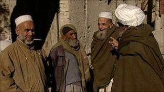 Afghan men talking in the street