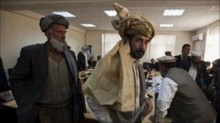 Winning candidates after receiving their certificates at the Election Commission in Kabul on 30 November 2010