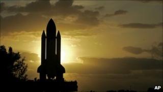 Space shuttle at dawn