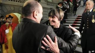Swiss National Assembly president Jean-Rene Germanier congratulates Micheline Calmy-Rey on her election as Swiss president, 8 December