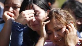 Relatives outside the San Miguel passion on 8 December
