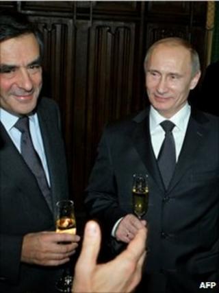 French Prime Minister Francois Fillon (left) meets his Russian counterpart, Vladimir Putin, in Moscow, 8 December