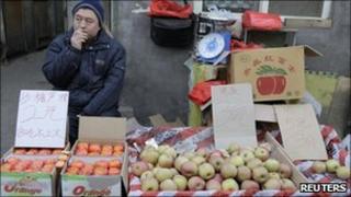 Stallholder in Beijing, file pic