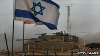 An Israeli tank manoeuvres near the Kissufim crossing into Gaza (archive image)