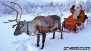 Santa and his reindeer in Finnish Lapland
