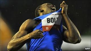 World and Olympic triple gold medallist Usain Bolt reacts on the finish line in the 300m at the IAAF World Challenge in Ostrava on May 27, 2010