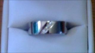 One of the custom-made wedding rings that were stolen