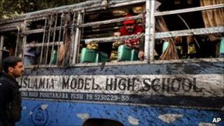 The damaged school bus in Peshawar on 13 December 2010