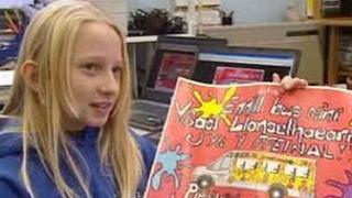 Cara with her design for the school bus