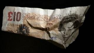 A crumbled £10 note