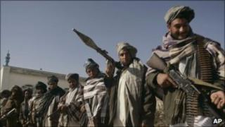 Former Taliban fighters surrender weapons in Herat, Dec 2010